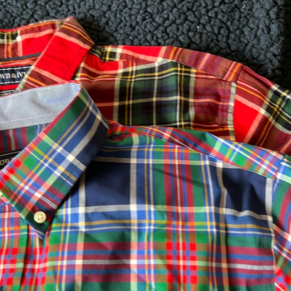 Brand new, never worn dress shirts. They both are size “M”